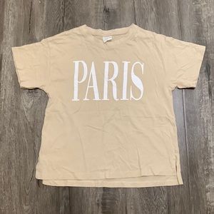 A brown Zara shirt with PARIS written on it